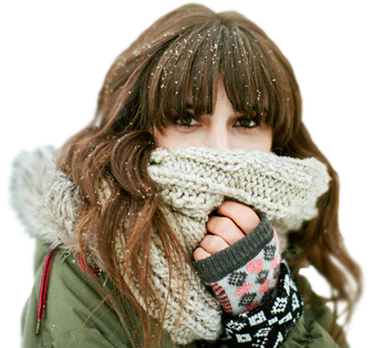 owman wrapped in a warm coat and a thick scarf over her face
